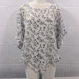 Lily Morgan stretchy white top with floral batwing sheer overlay​​​​​​​​​​